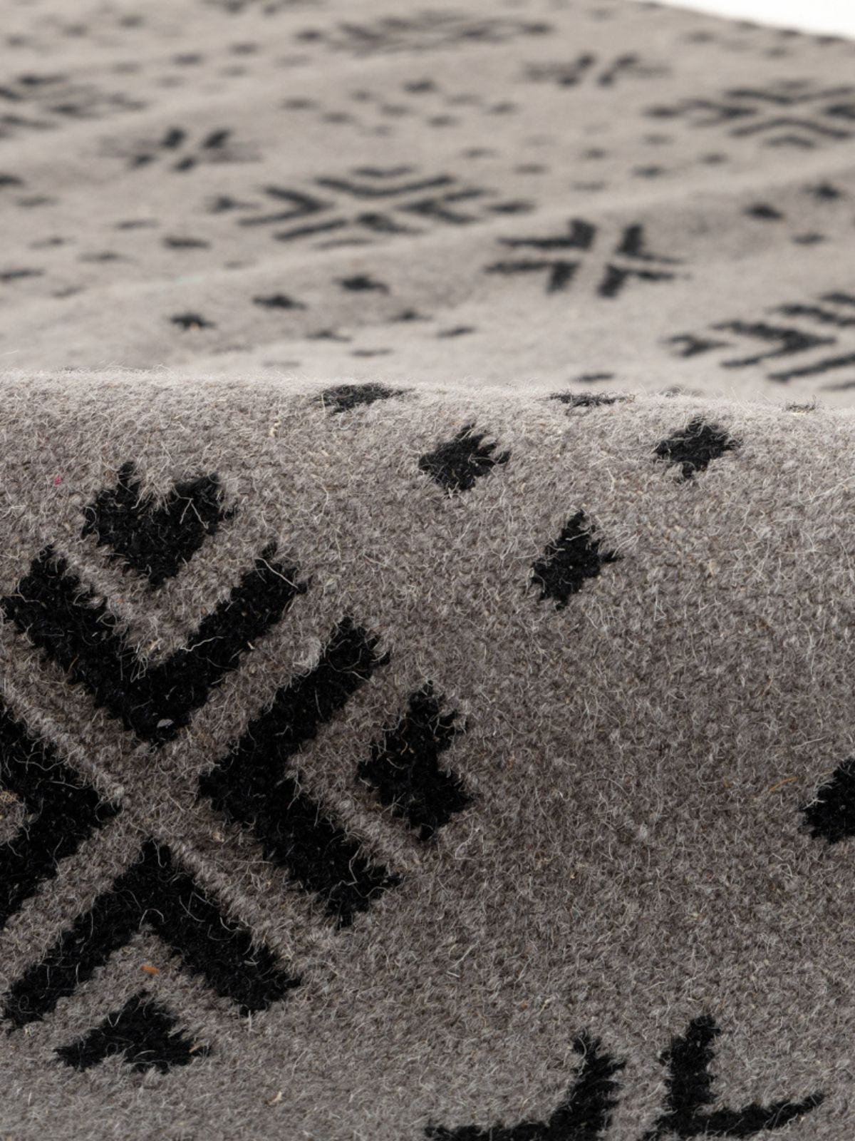 Arrow Dot Weave Rug detail of the geometric pattern in cotton