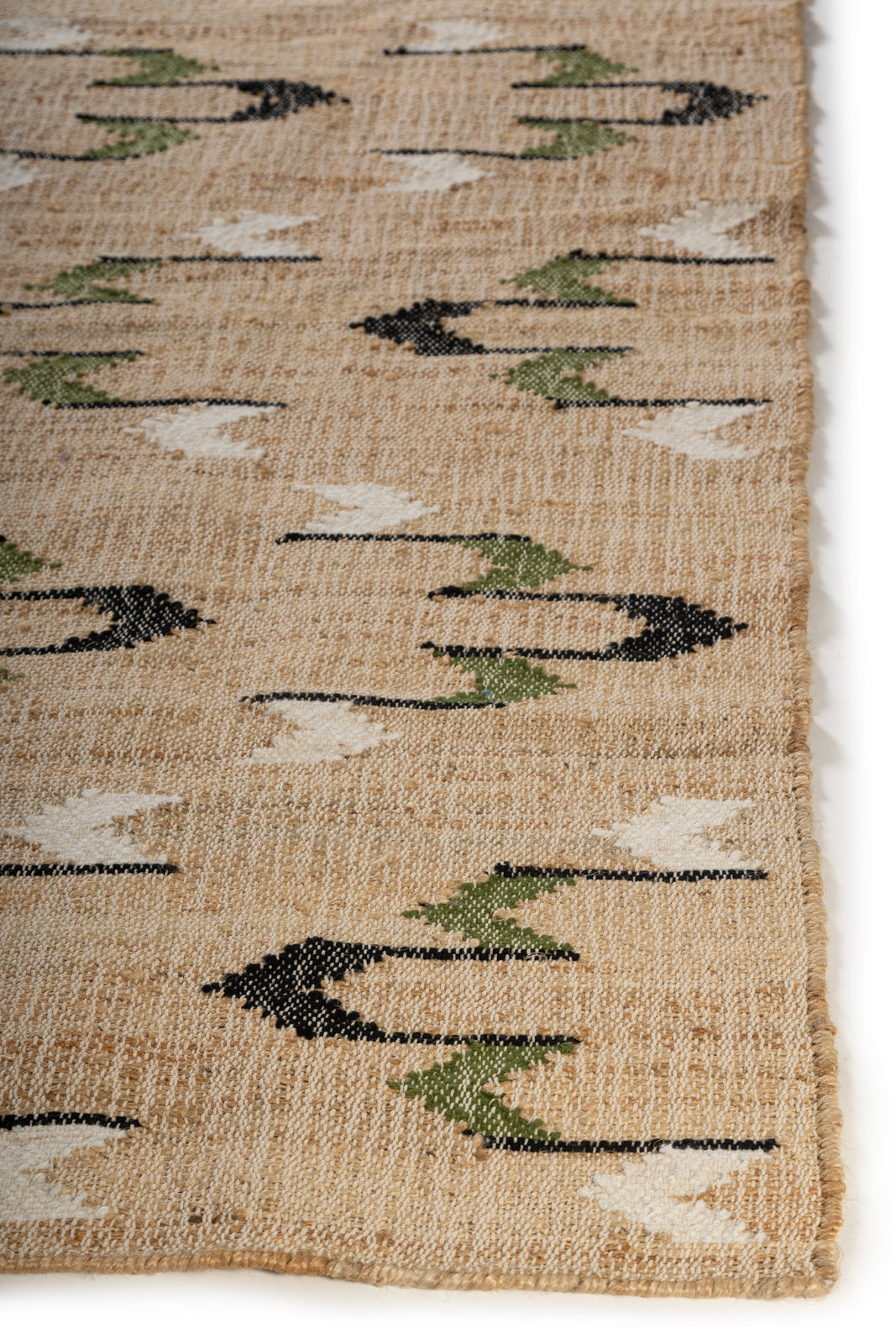 Arrowwood wool rug styled in a living room interior