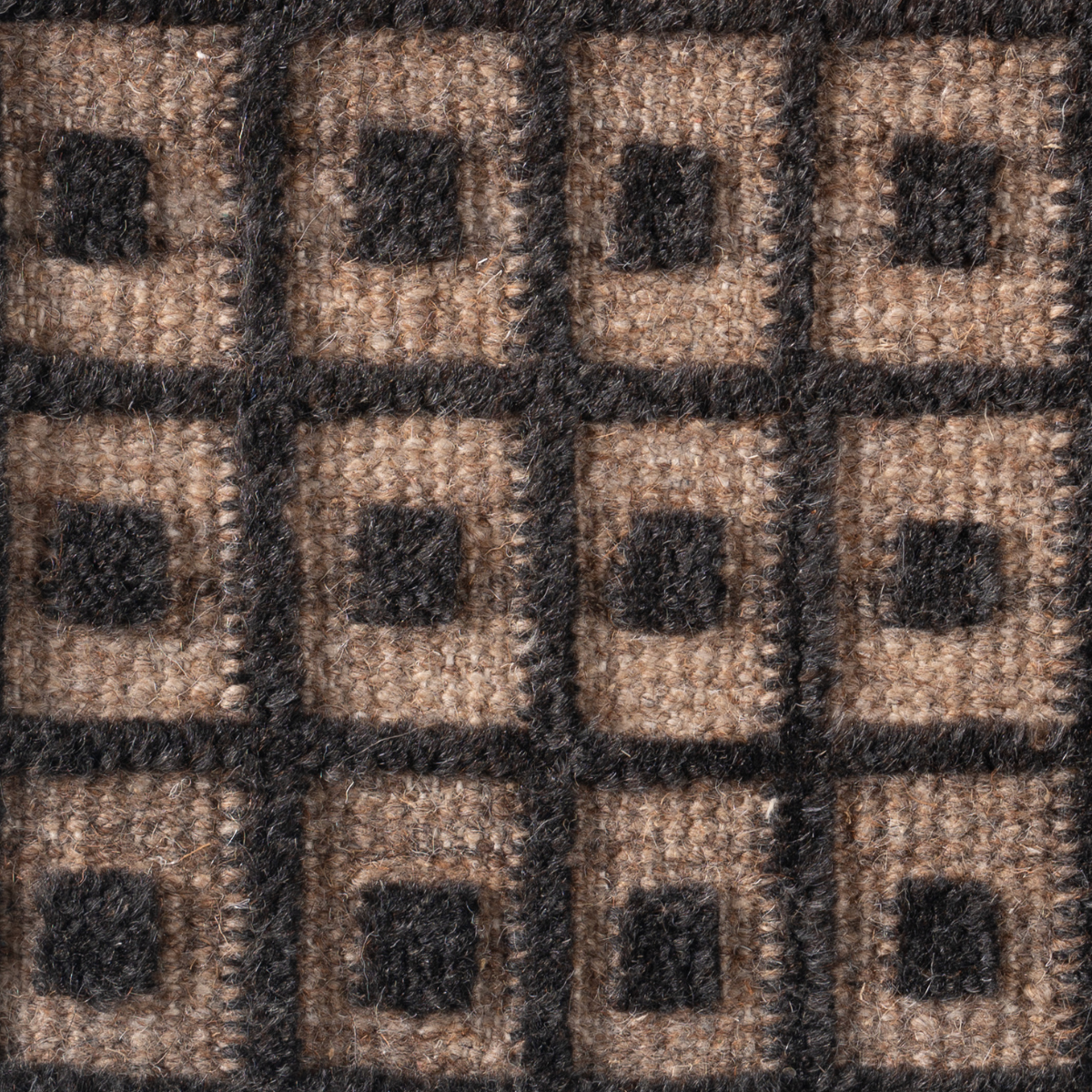 Artisan's Trace : Heritage Frame close-up showing the wool weave and traditional motif