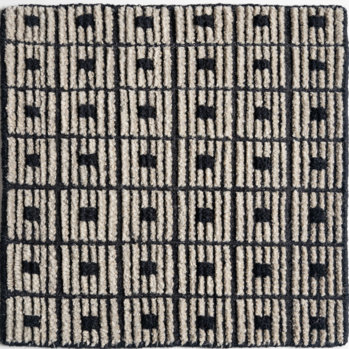Artisan's Trace : Iron Lattice wool rug in grey tones, overhead view