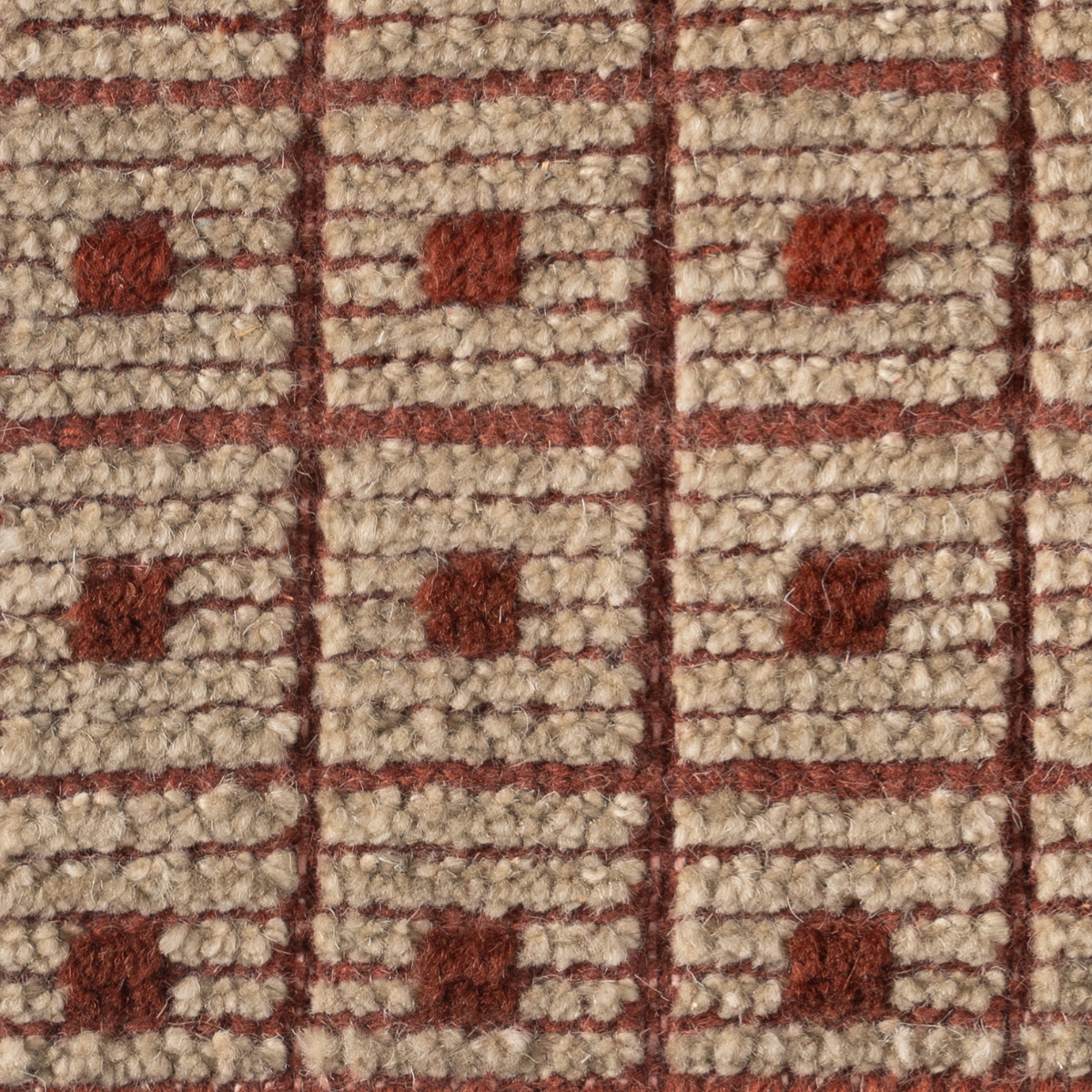 Artisan's Trace : Terra Cotta Block close-up showing the wool weave and geometric motif