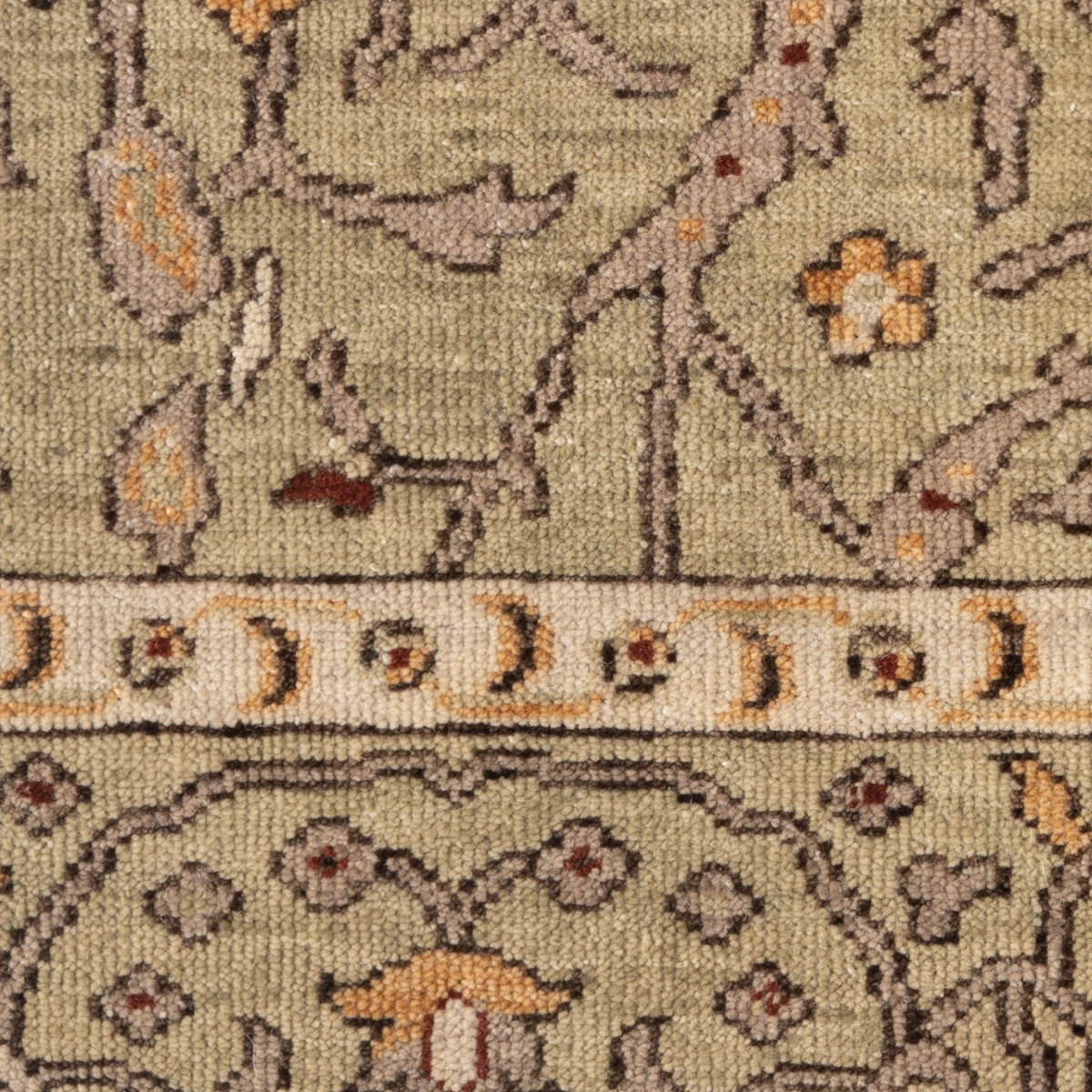 Artisan's Trace : Wild Sage Filigree close-up showing the wool pile and floral motif