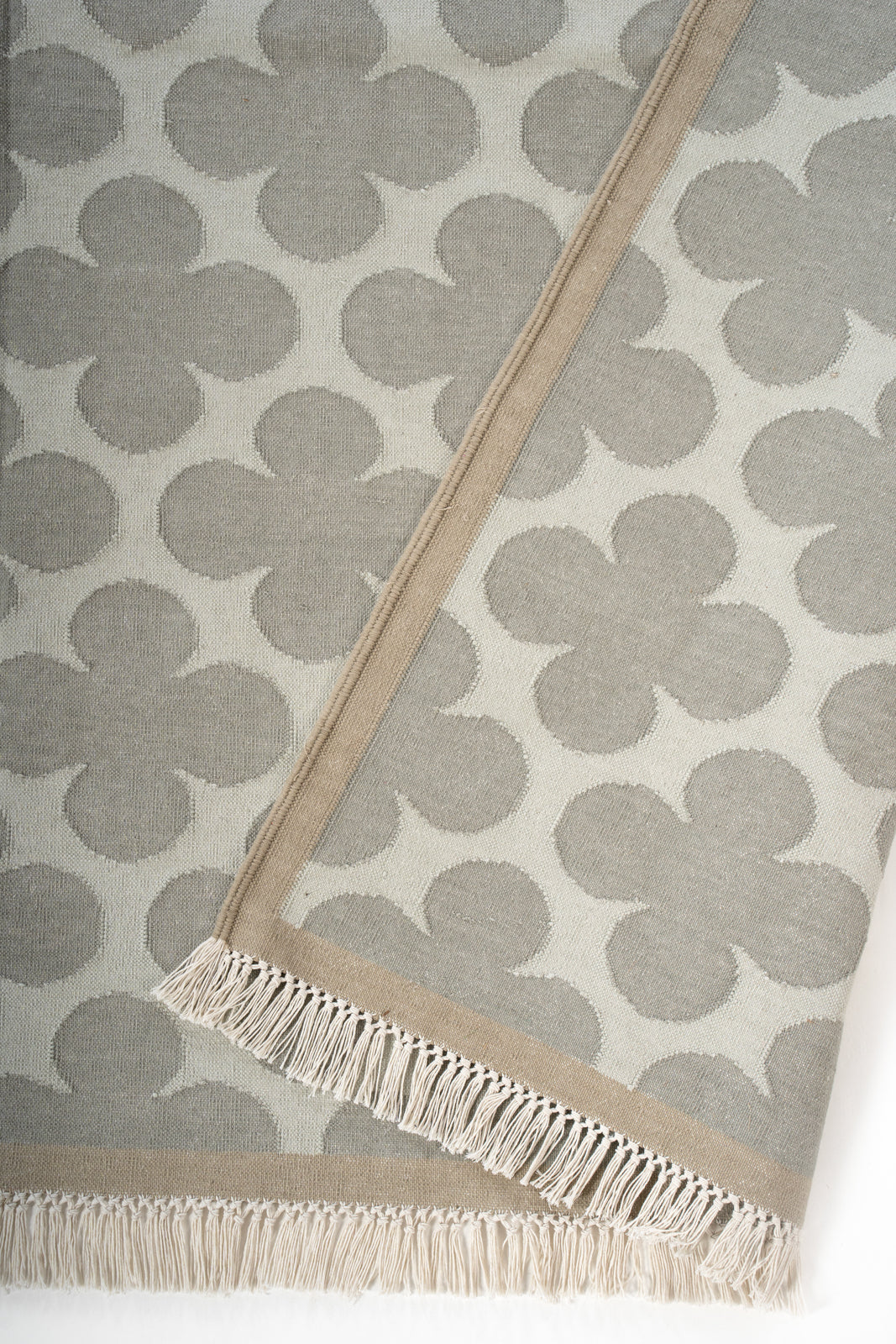 Ash Bloom Flatweave Rug detail of the floral motif in cotton cut pile