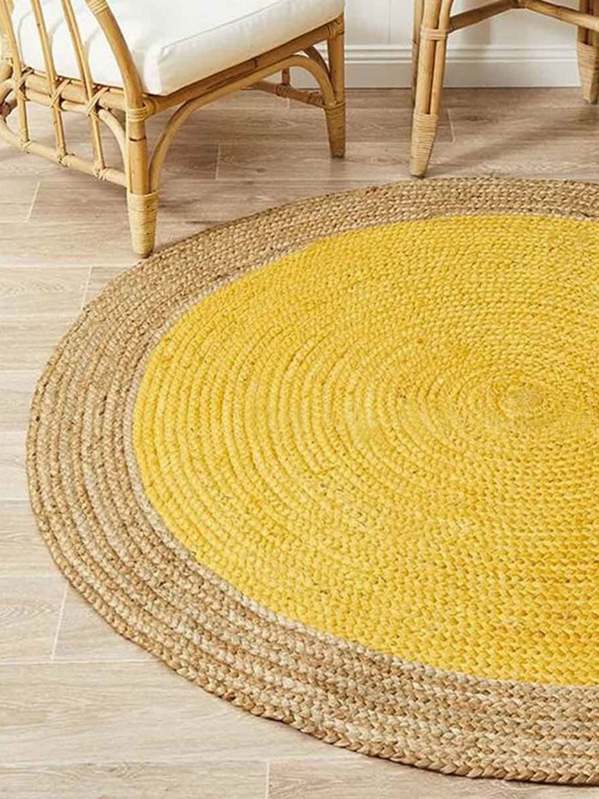 Asmara bordered round rug-Chrome cotton rug styled in a living room interior