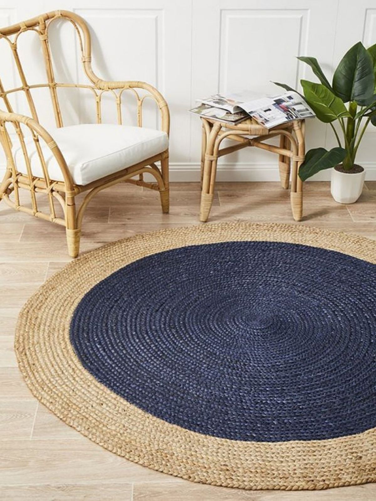 Asmara bordered round rug-Navy jute rug styled in a designed interior