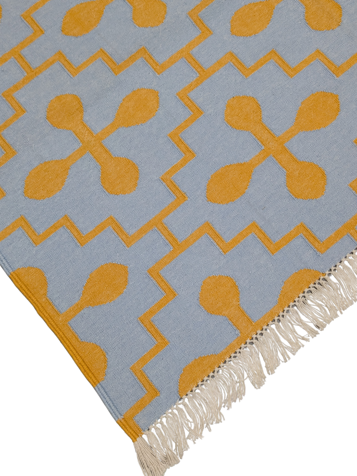Azure Bloom Flatweave Rug close-up showing the cotton pile and floral motif