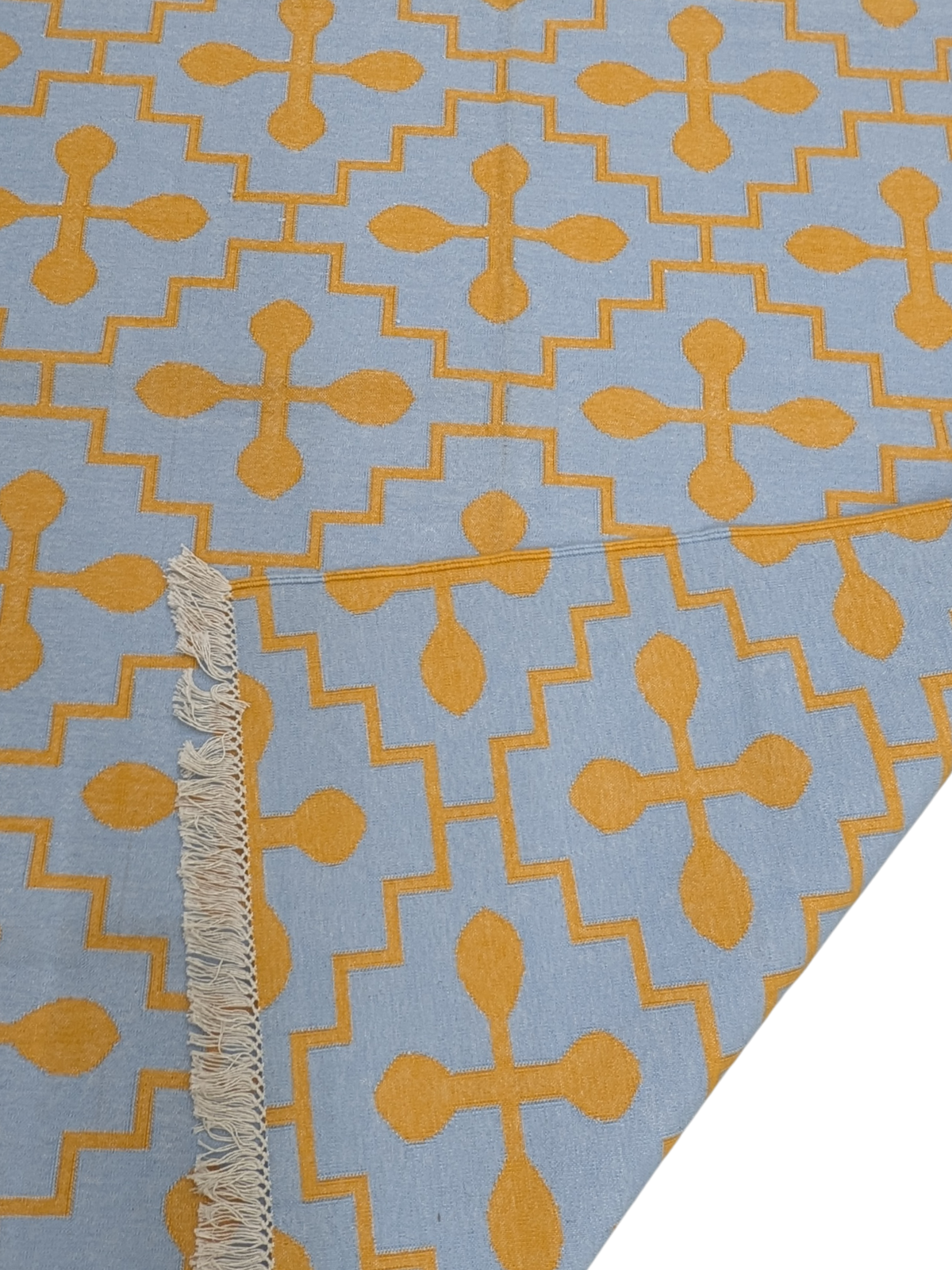 Azure Bloom Flatweave Rug detail of the floral motif in cotton cut pile