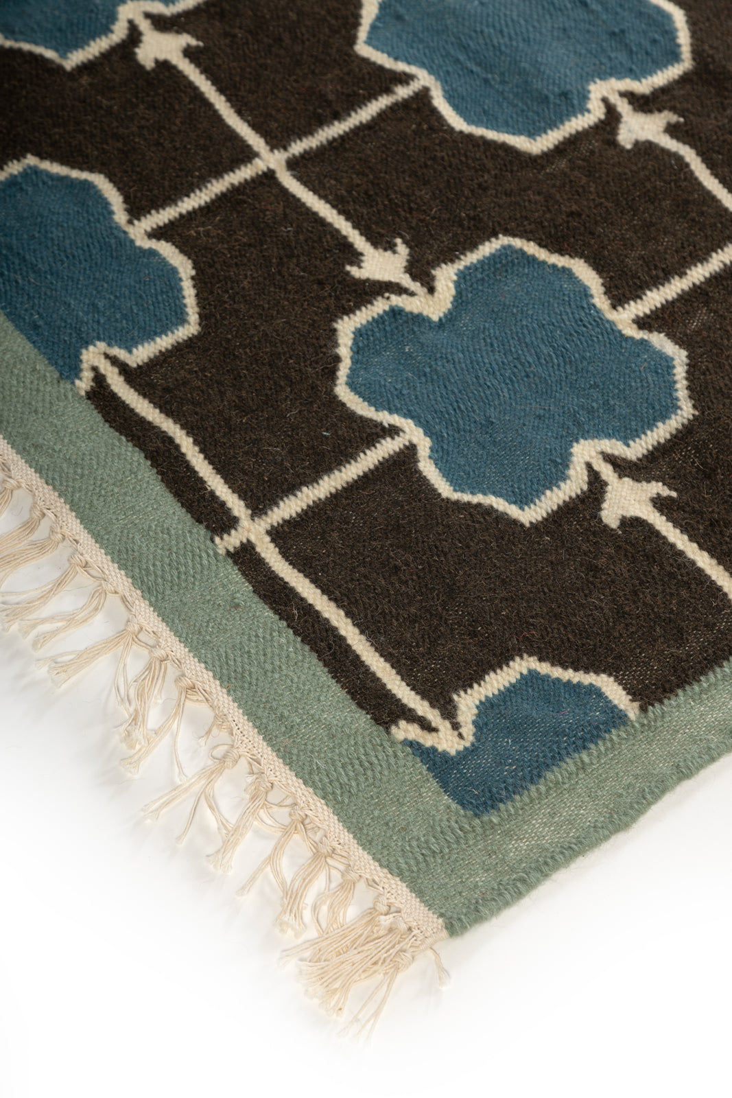 Azure Trellis Rug close-up showing the wool weave and geometric motif