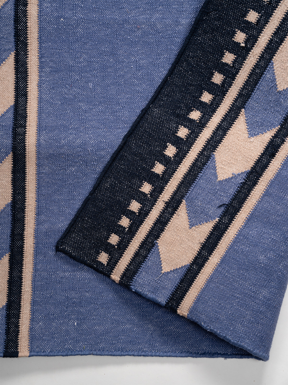 Bay Moor Runner detail showing edge binding and cotton finishing of the runner
