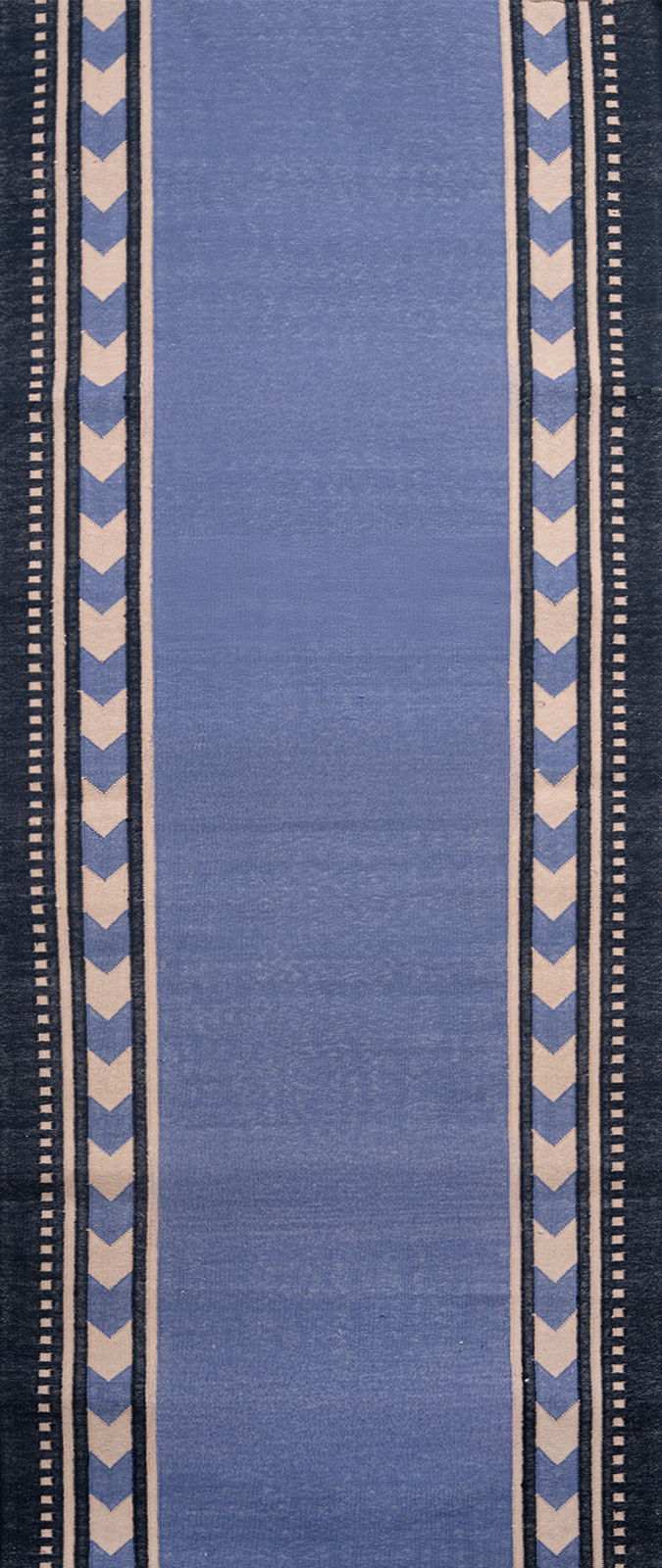 Bay Moor Runner in cotton, laid along a staircase to show full length and proportion