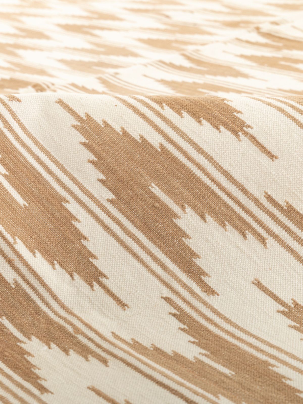 Beige Mist Ikat Dreams Rug detail of the geometric pattern in cotton