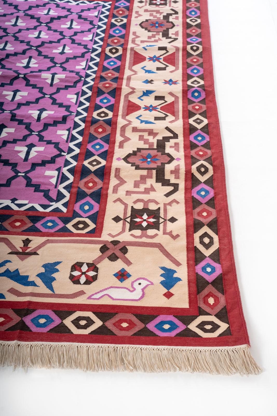 Bikaner Heritage Vintage Cotton Dhurrie Rug cotton rug styled in a living room interior