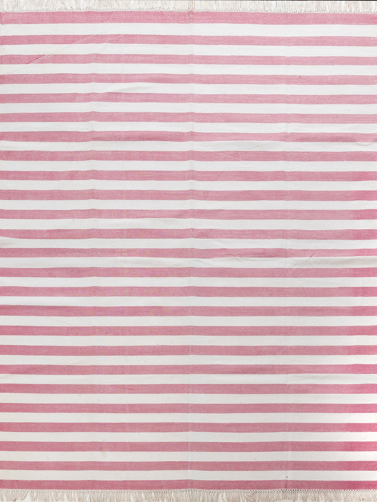 Blush Coast cotton rug in pink tones