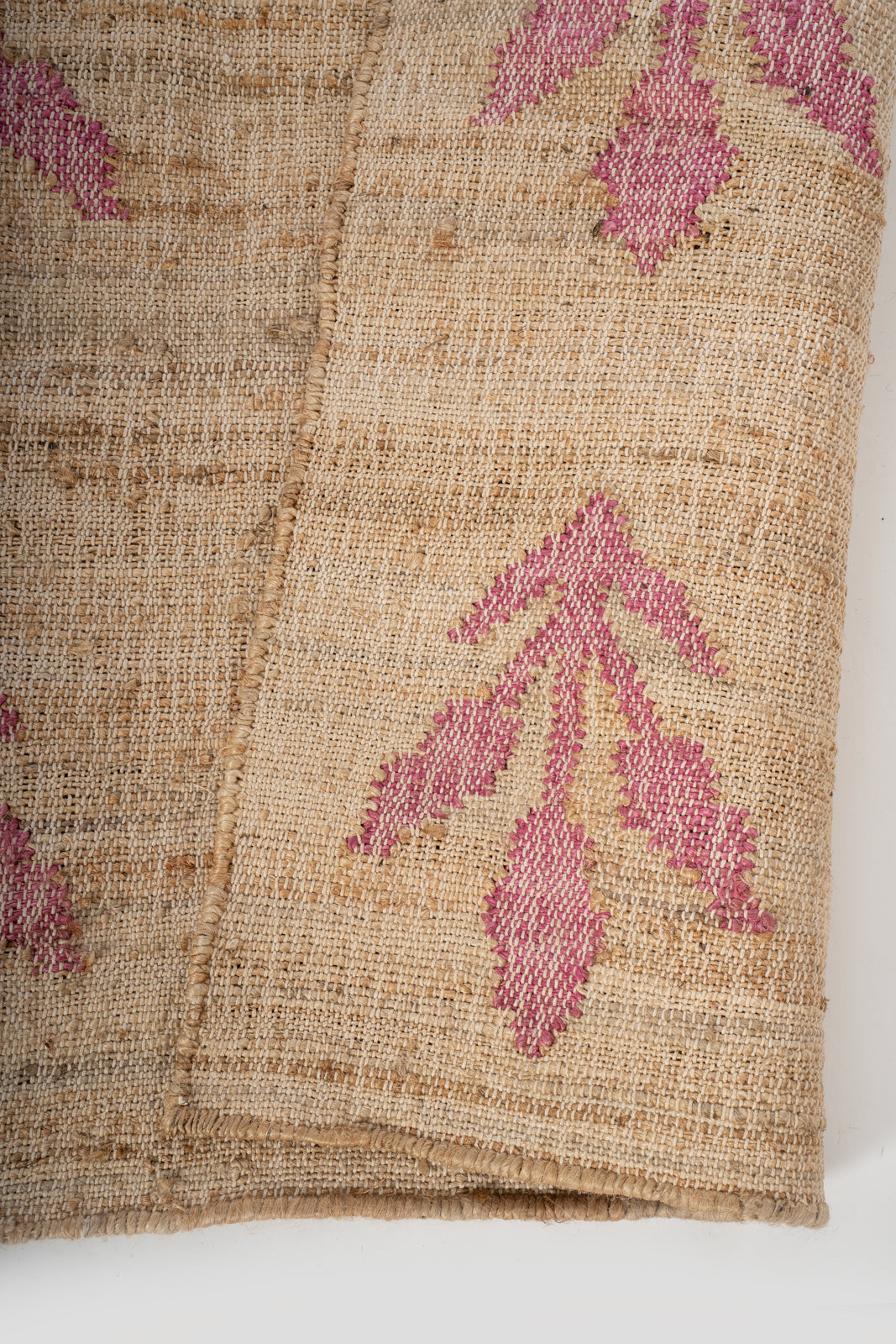 Blush Garden Jute Rug detail of the floral motif in jute cut pile
