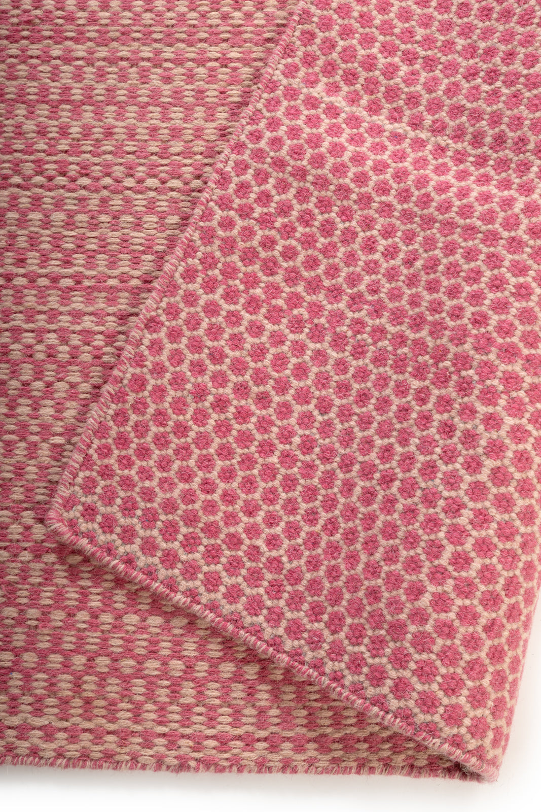 Blush Horizon Wool Rug detail of the striped wool surface and edge finishing