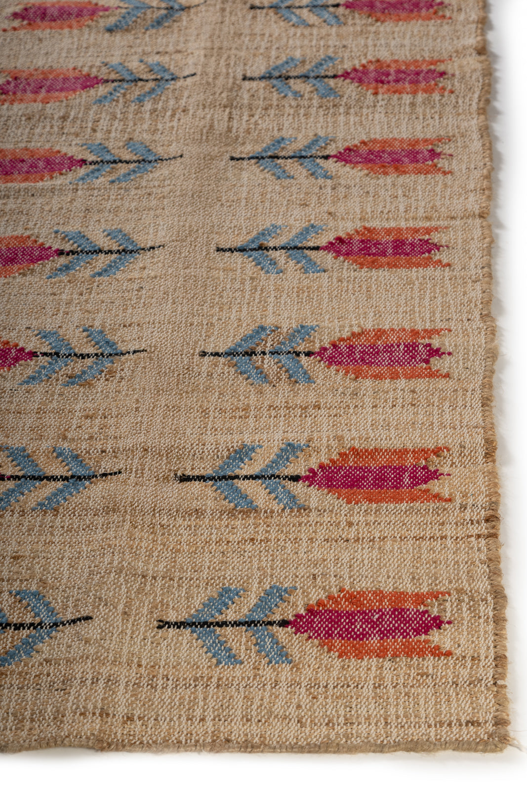 Botanical Bloom wool rug styled in a living room interior