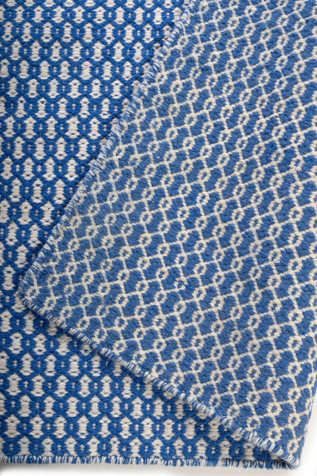 Burlap Breeze Rug detail showing the textured jute surface and finishing
