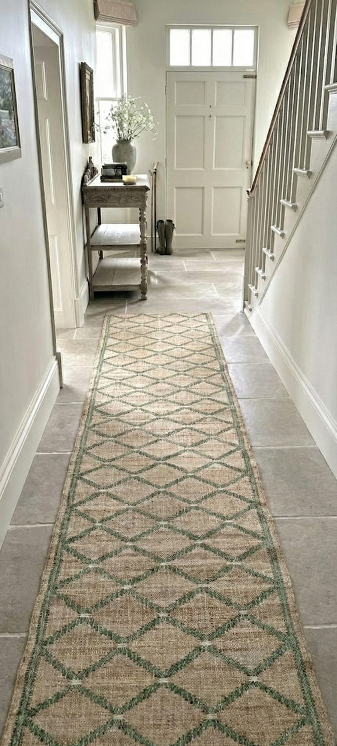 Cairo Artisanal Jute-Cotton Runner-Green - cotton-jute runner laid in a hallway view