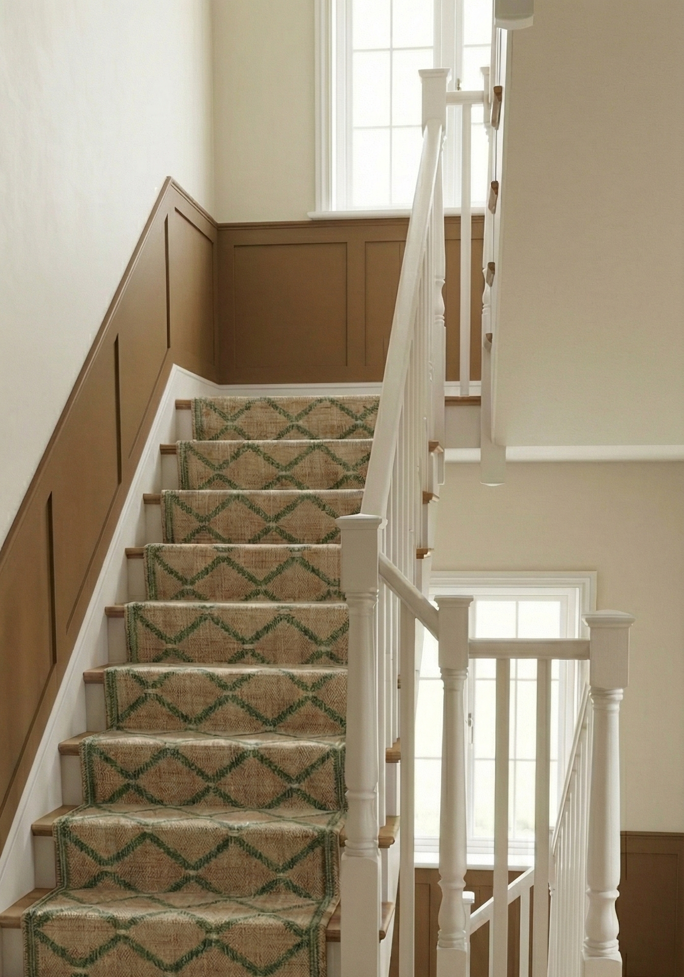 Cairo Artisanal Jute-Cotton Runner-Green cotton-jute stair runner styled on a staircase in a designed interior