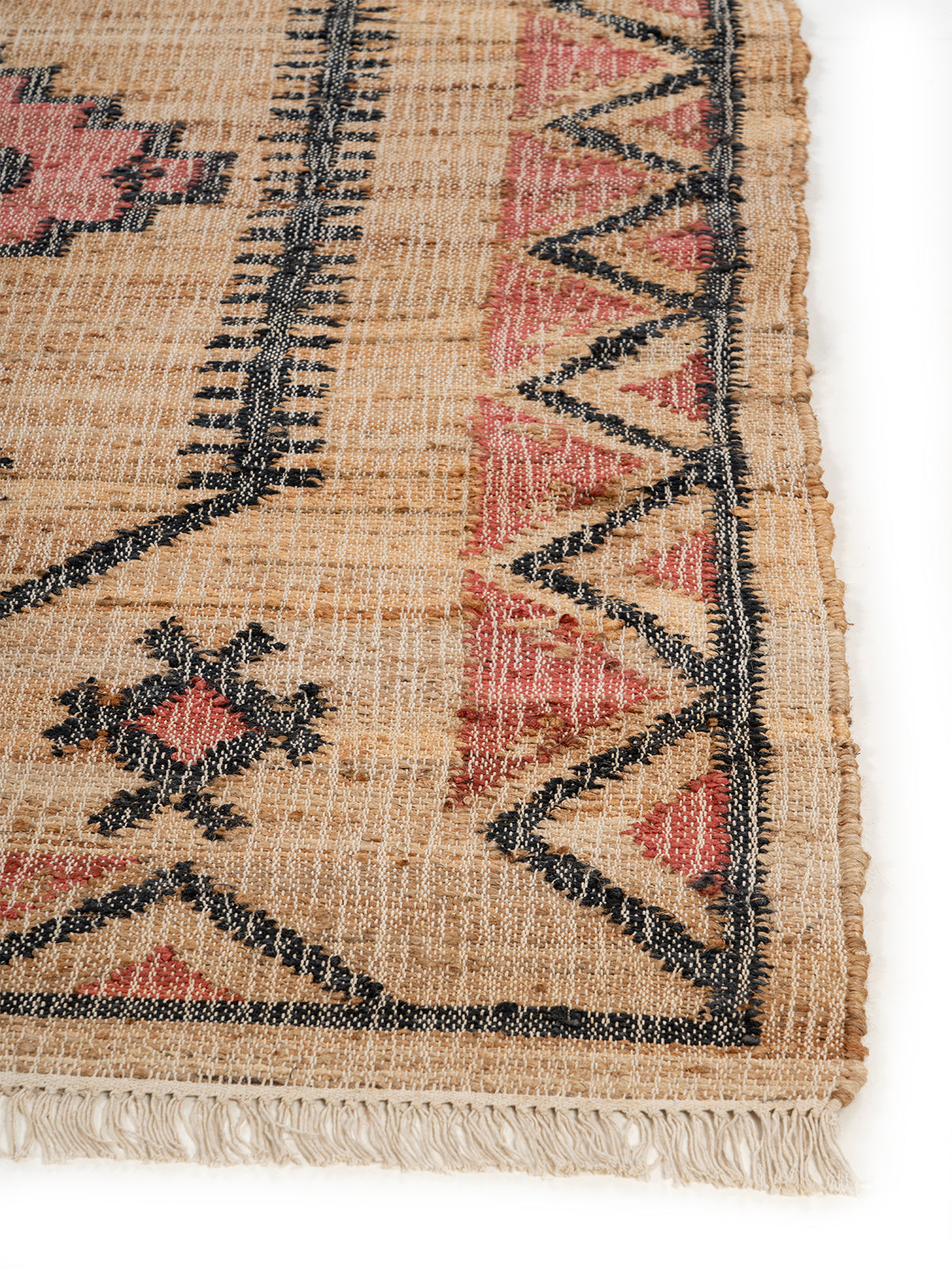 Charcoal Geometric Jute Rug jute rug styled in a living room interior