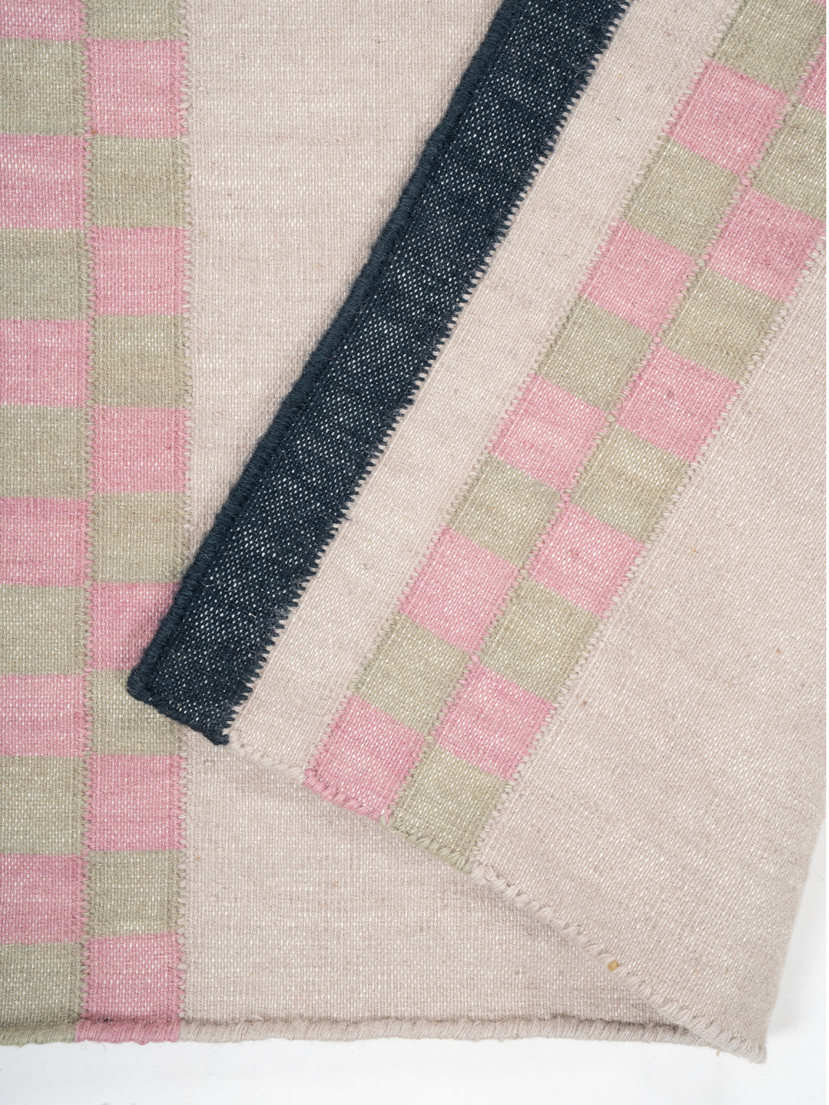 Checkerboard Stream Runner-Beige detail showing edge binding and cotton finishing of the runner