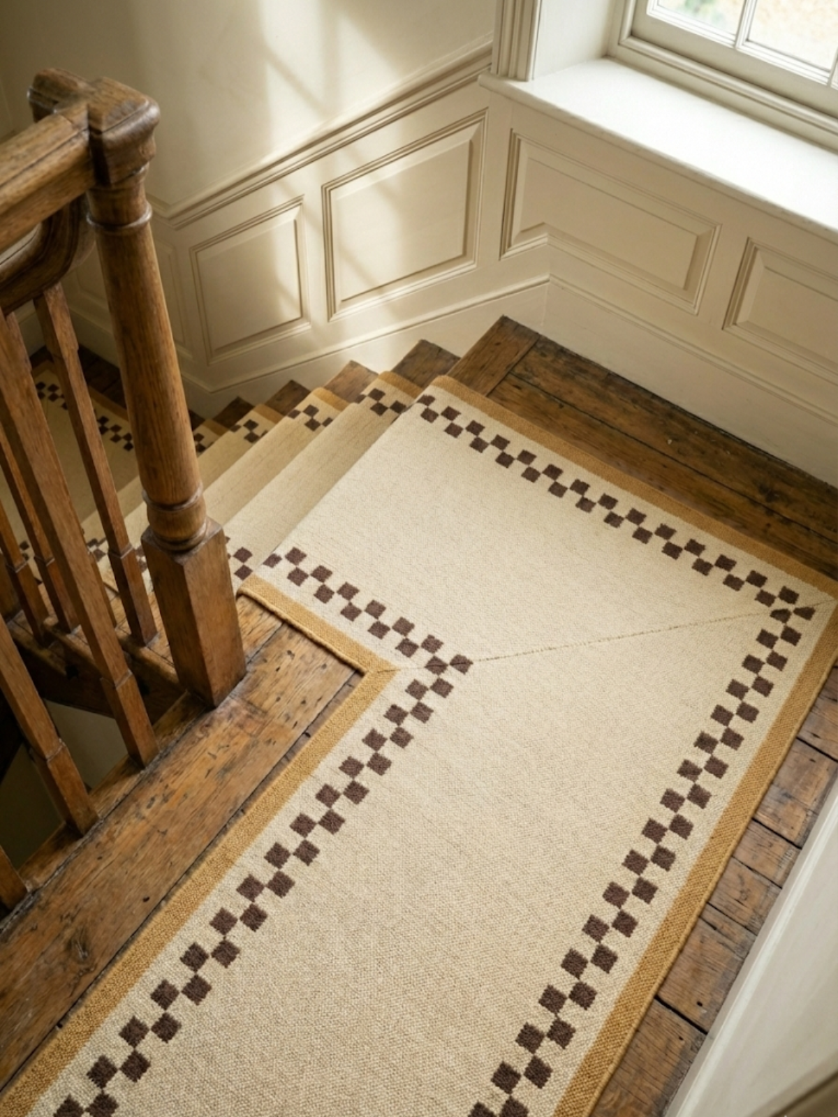 Checkerboard Stream Runner-Yellow cotton stair runner styled on a staircase in a designed interior