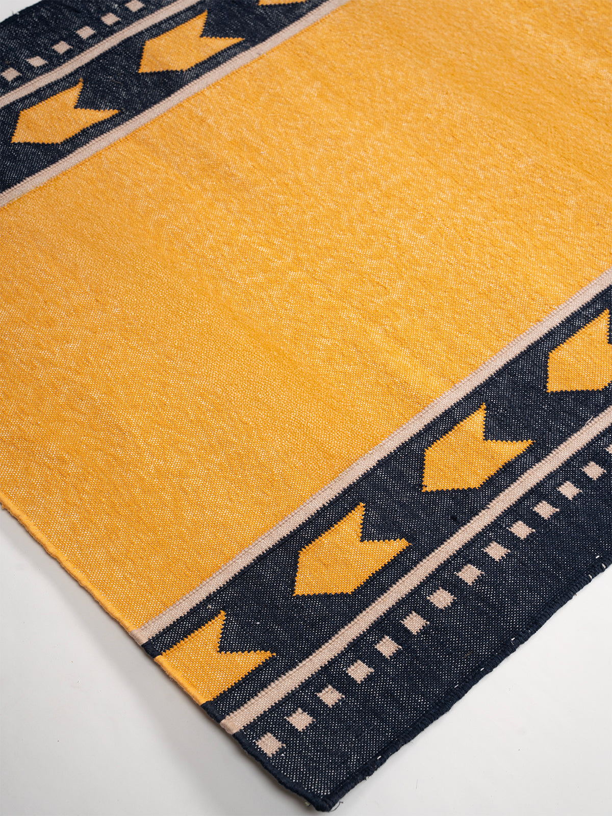 Chrome Moor Runner - cotton runner laid in a hallway view