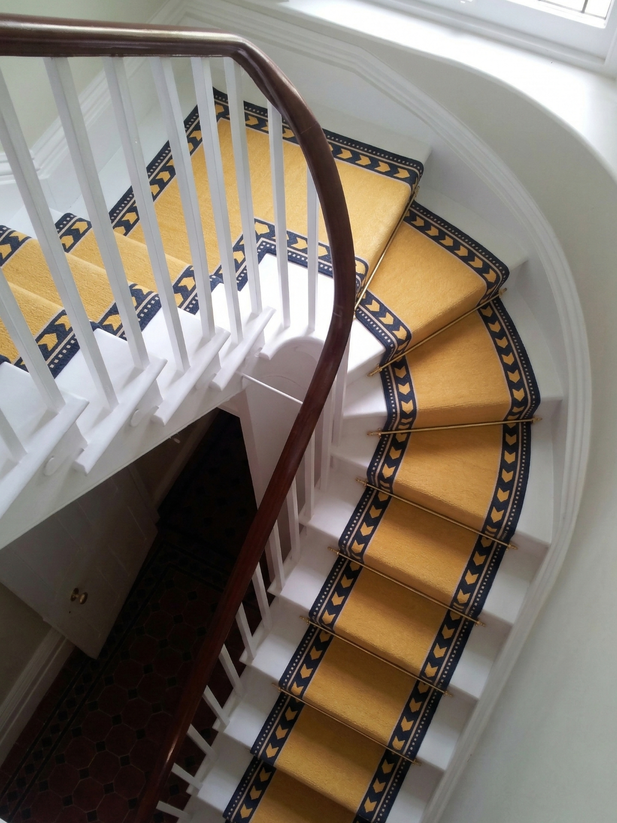 Chrome Moor Runner cotton stair runner styled on a staircase in a designed interior