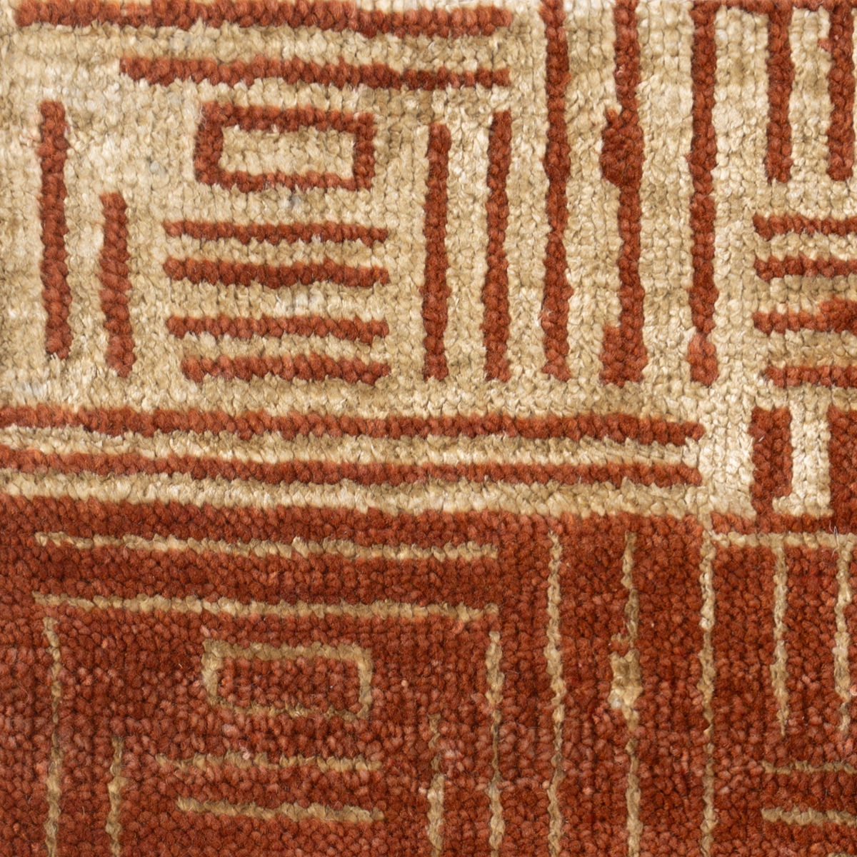 Cipher : Sienna Scroll close-up showing the bamboo silk weave and geometric motif