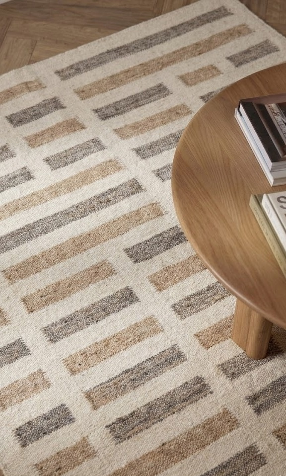 Cobblestone Path Wool Rug wool rug styled in a living room interior