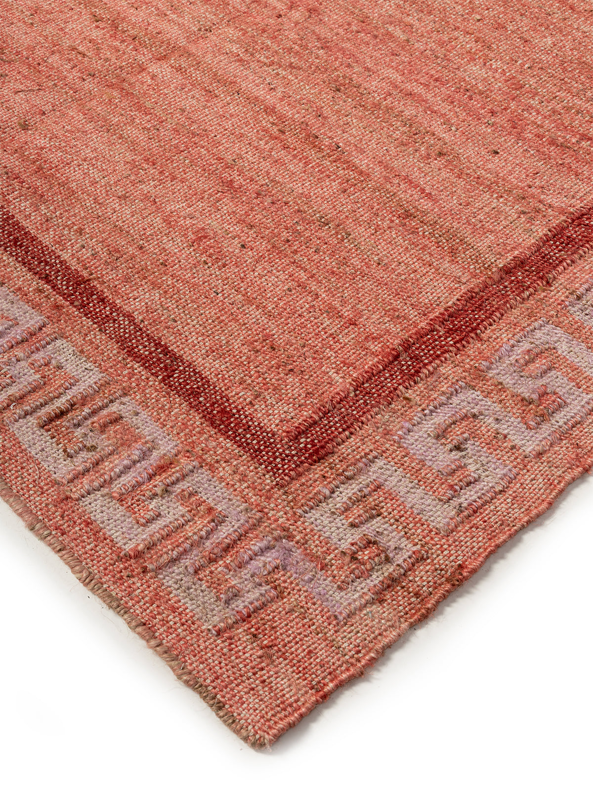 Coral Maze Jute Rug close-up showing the jute weave and geometric motif