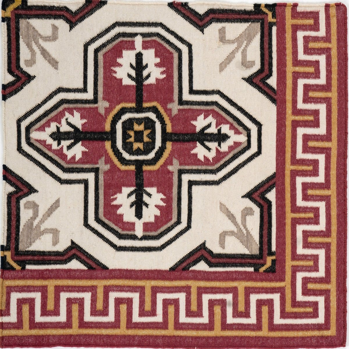 Crimson Cross Heritage close-up showing the wool weave and traditional motif