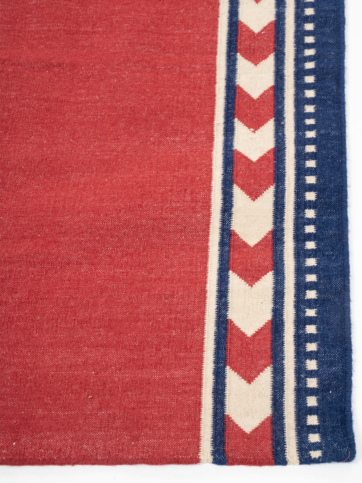 Crimson Moor Runner - cotton runner laid in a hallway view