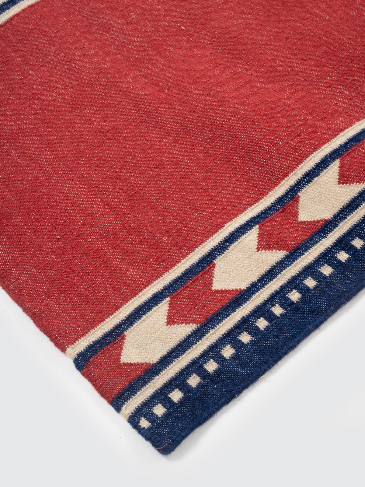 Crimson Moor Runner close-up showing the cotton weave and stripes surface