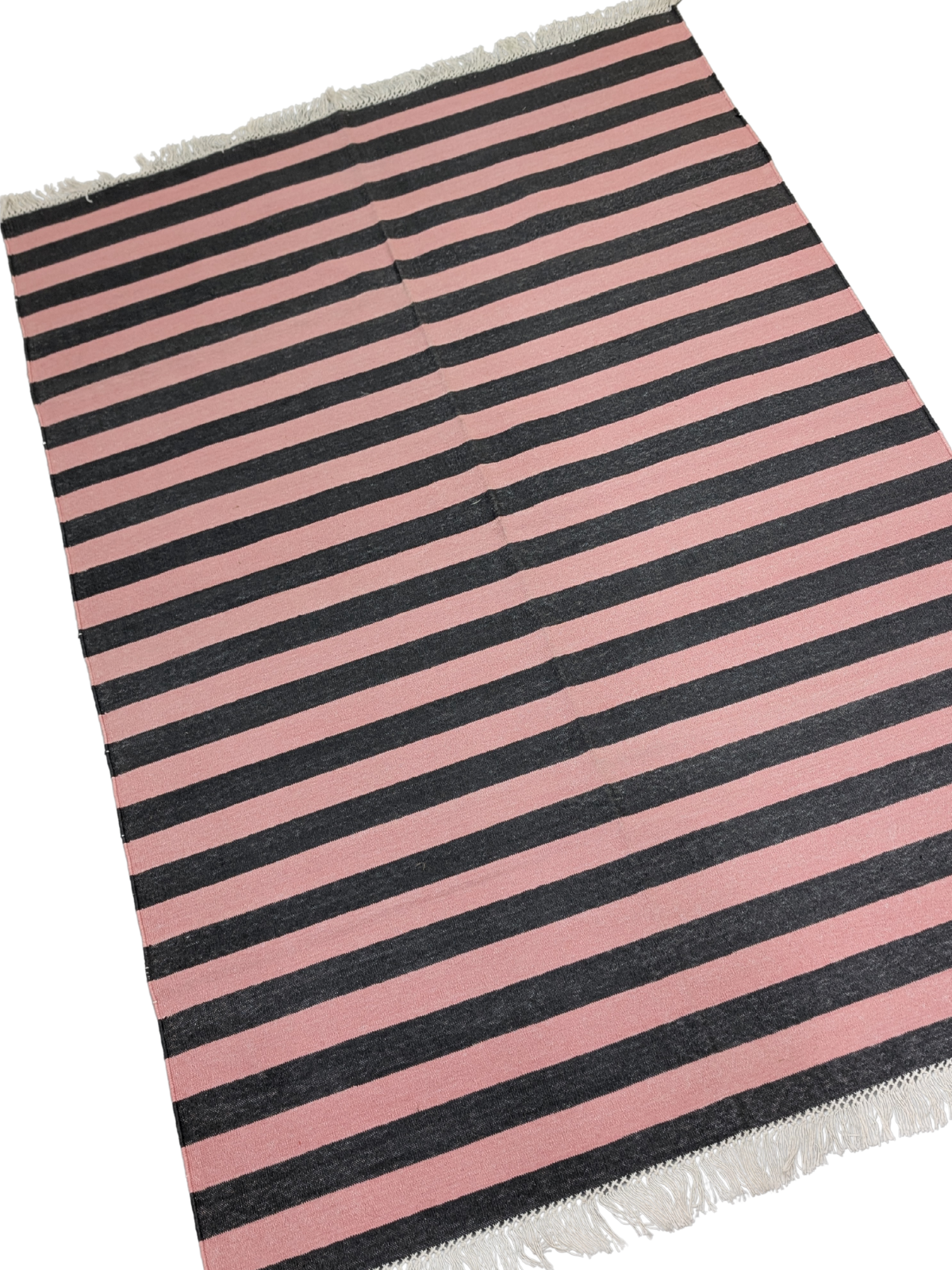 Crimson Tide Striped Cotton Rug cotton rug styled in a living room interior