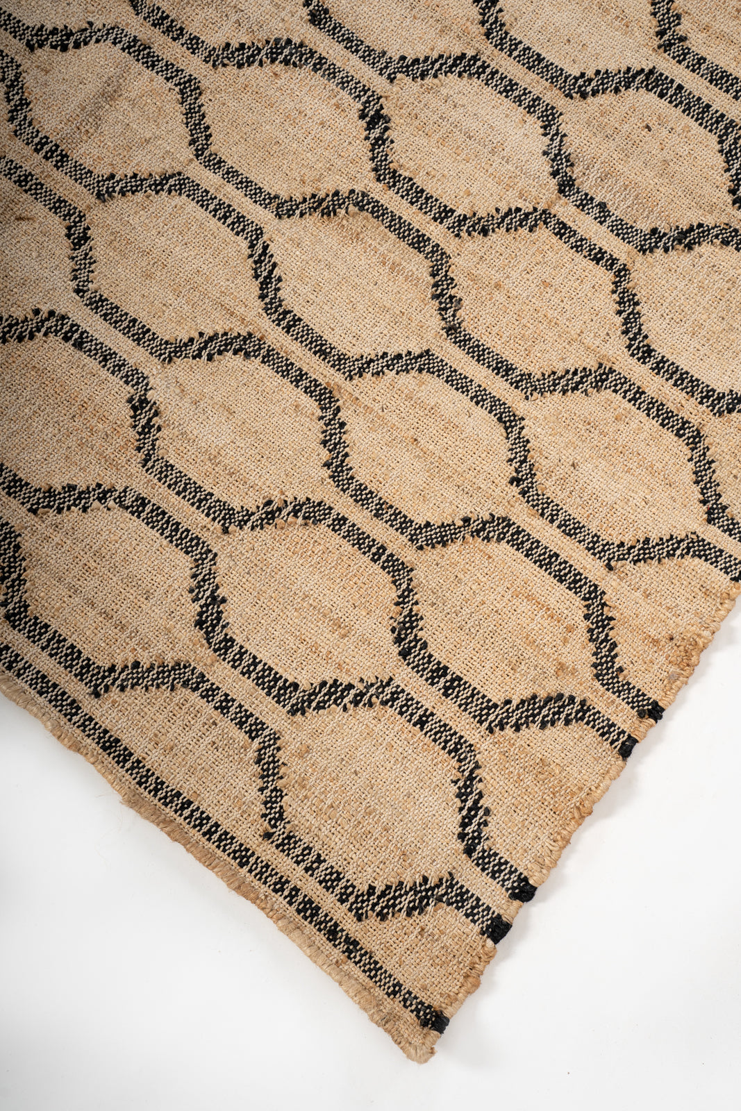 Desert Mirage Jute Rug close-up showing the jute weave and geometric motif