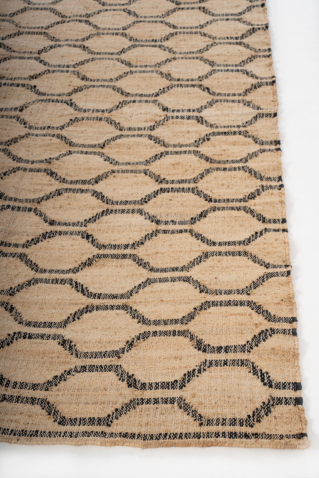Desert Mirage Jute Rug jute rug styled in a living room interior
