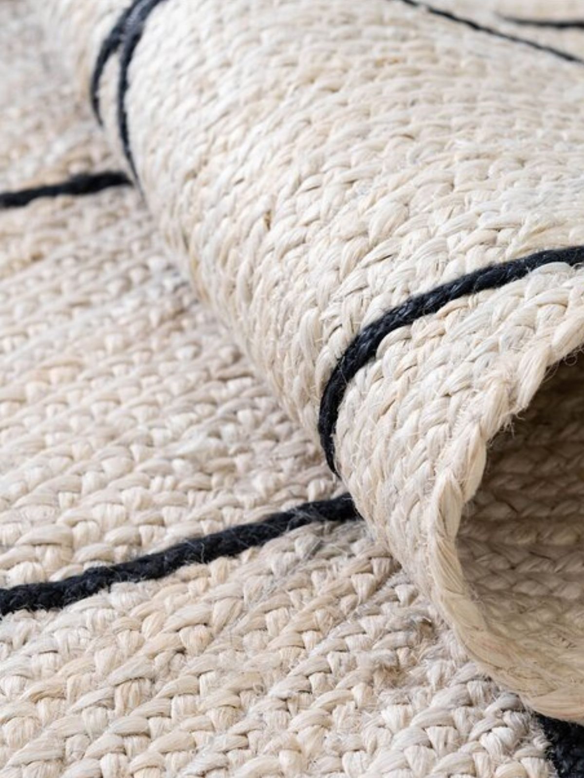 Dodoma Braided Runner detail showing edge binding and cotton finishing of the runner