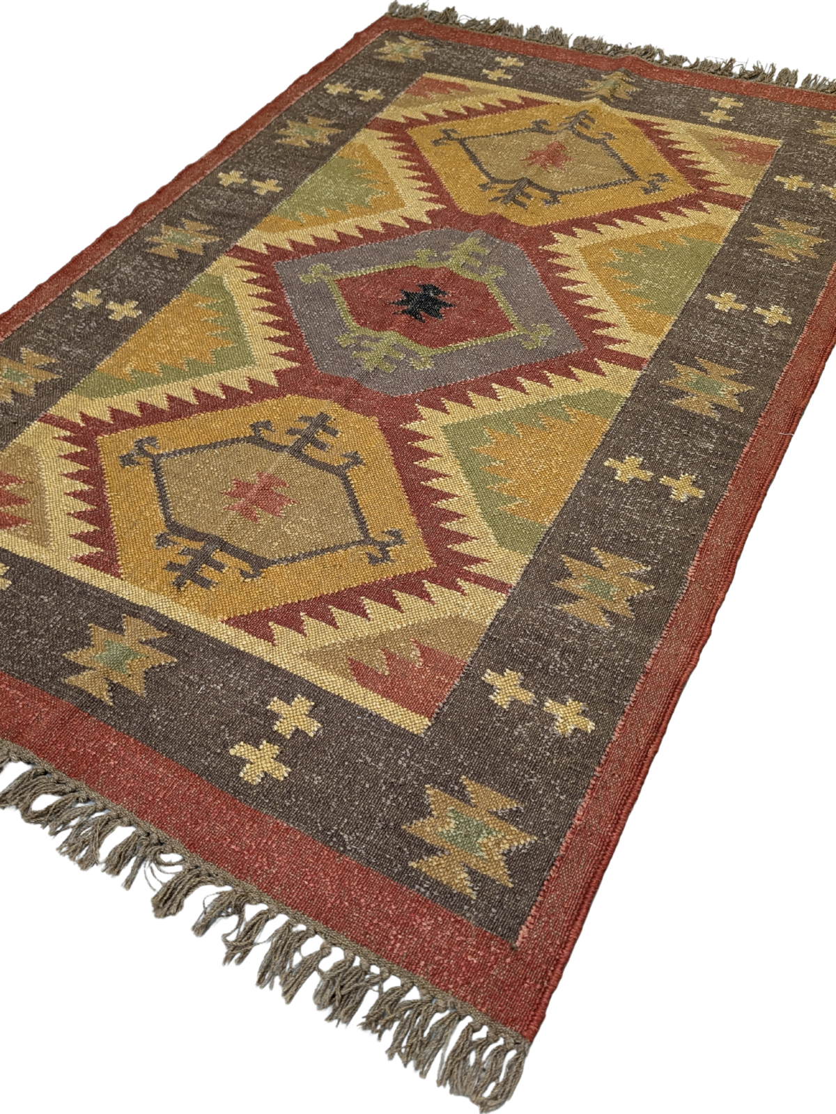 Earthbound Echo Kilim cotton rug styled in a living room interior