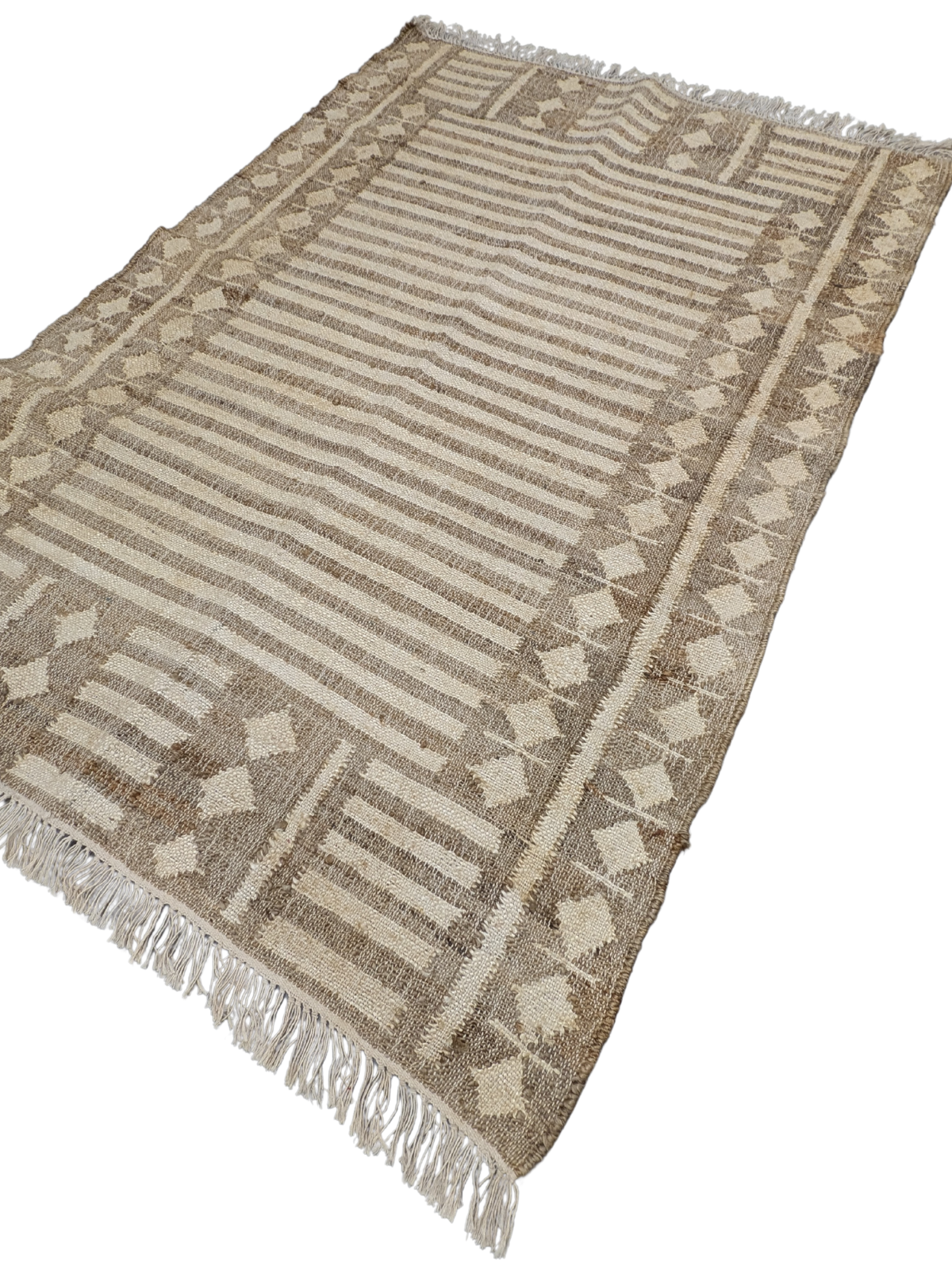 Earthen Echoes cotton rug styled in a living room interior