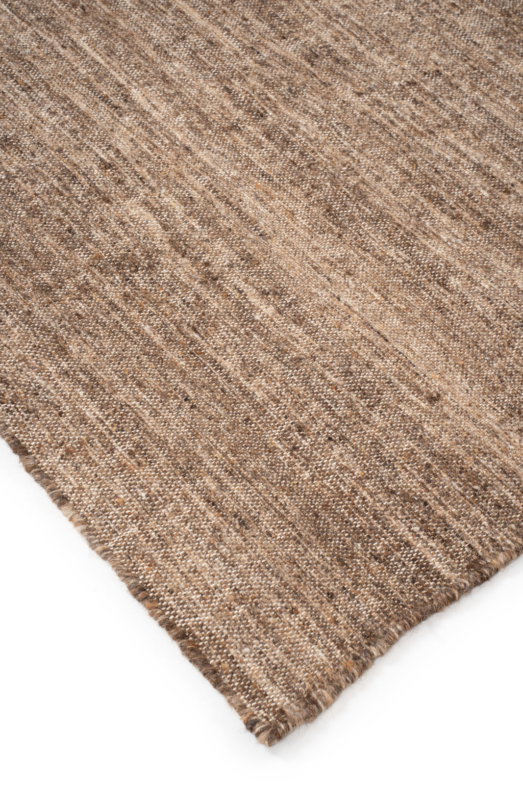 Earthen Essence Brown Wool Rug close-up showing the wool weave and surface texture