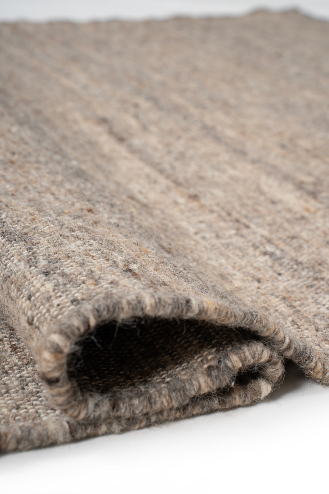 Earthen Essence Burnt Umber Wool Rug - additional product view showing the wool rug