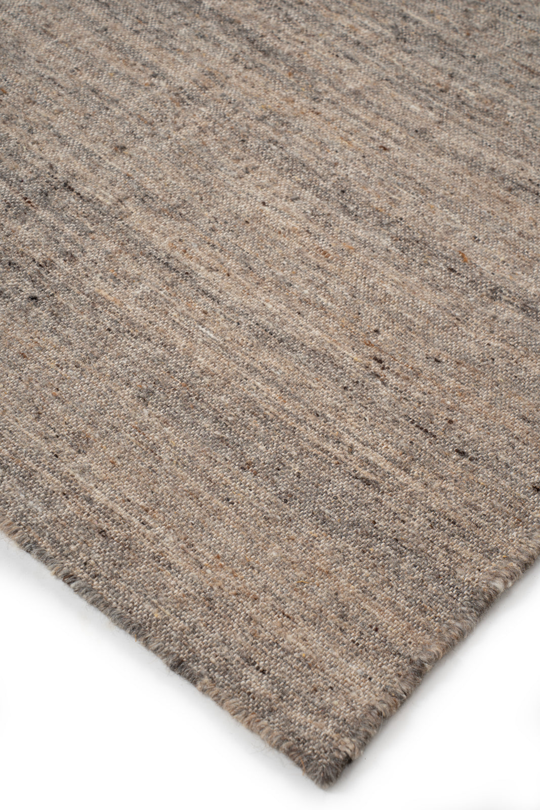 Earthen Essence Burnt Umber Wool Rug close-up showing the wool weave and surface texture
