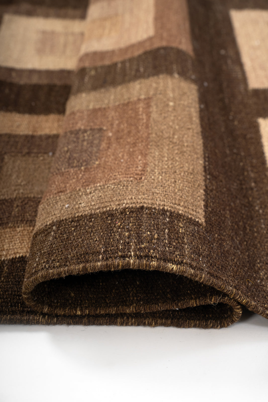 Earthy Geometric Wool Runner - wool runner laid in a hallway view