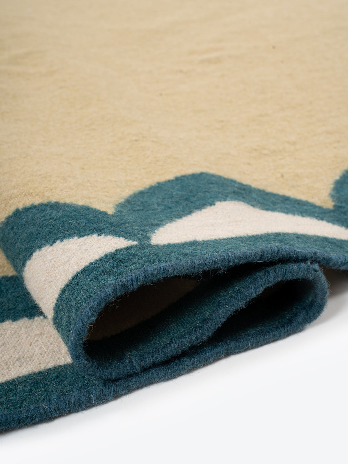 Ebb & Edge - edge detail showing wool finishing