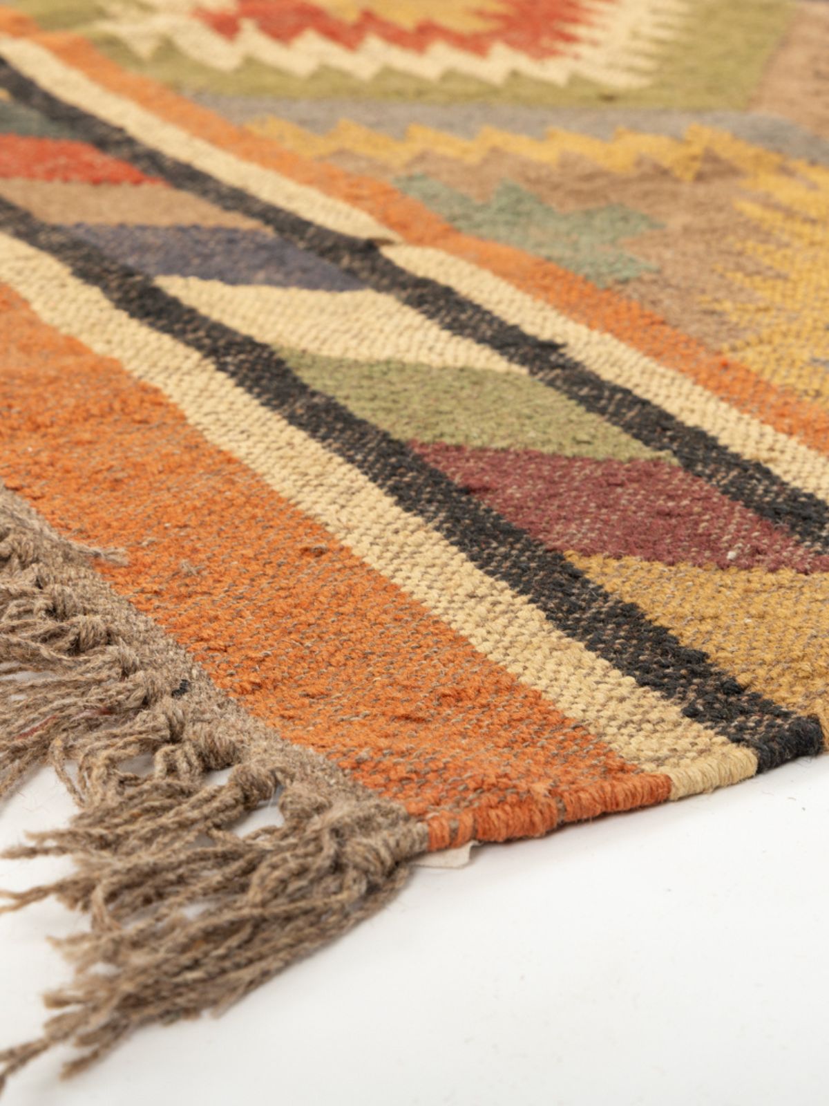 Eclectic Essence Kilim Rug close-up showing the cotton weave and traditional motif
