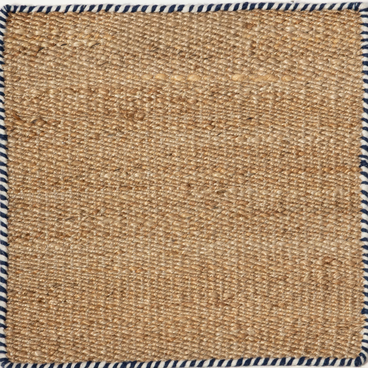 Edge - Coastal Ink jute rug in blue tones