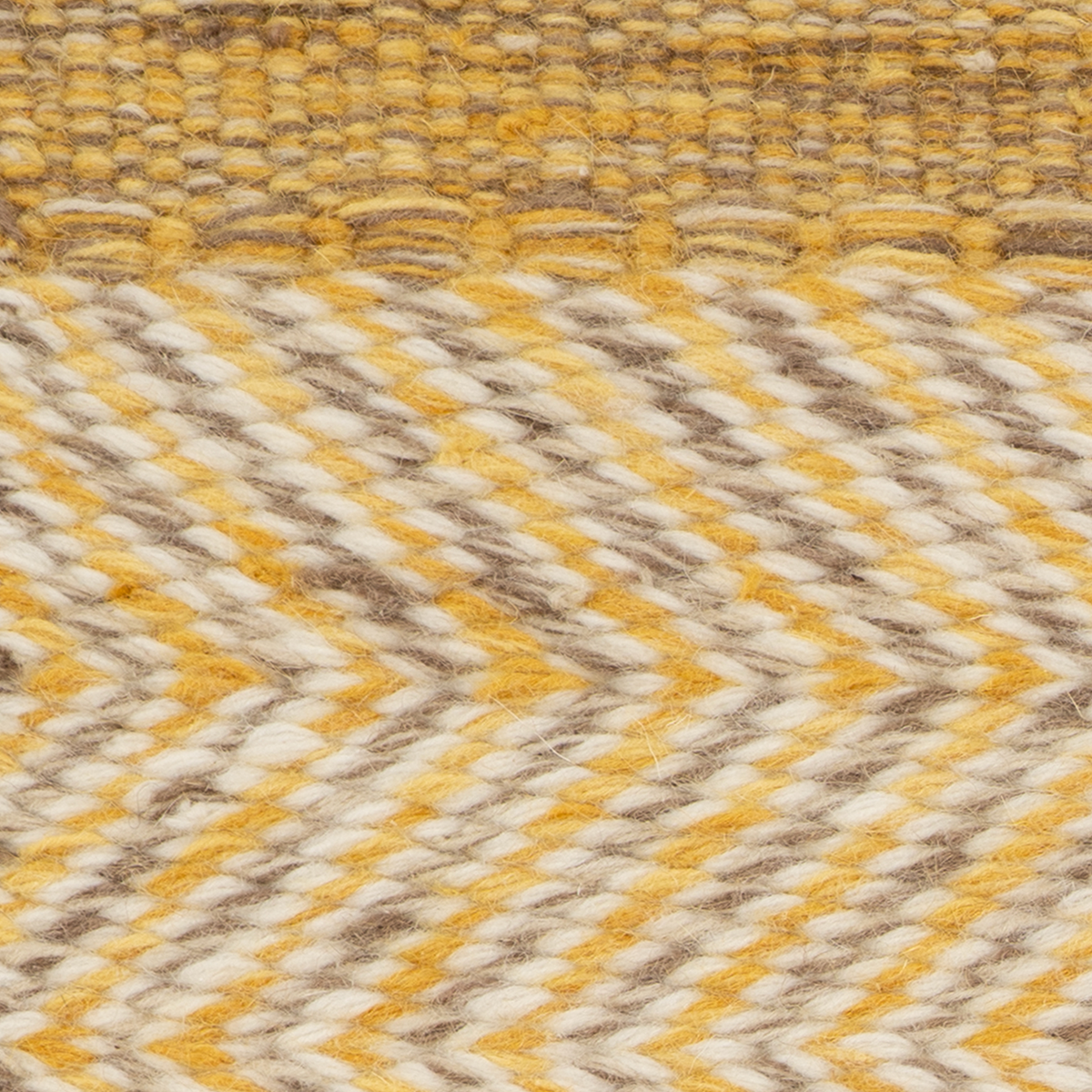 Eira : Amber Glow close-up showing the wool weave and striped pattern