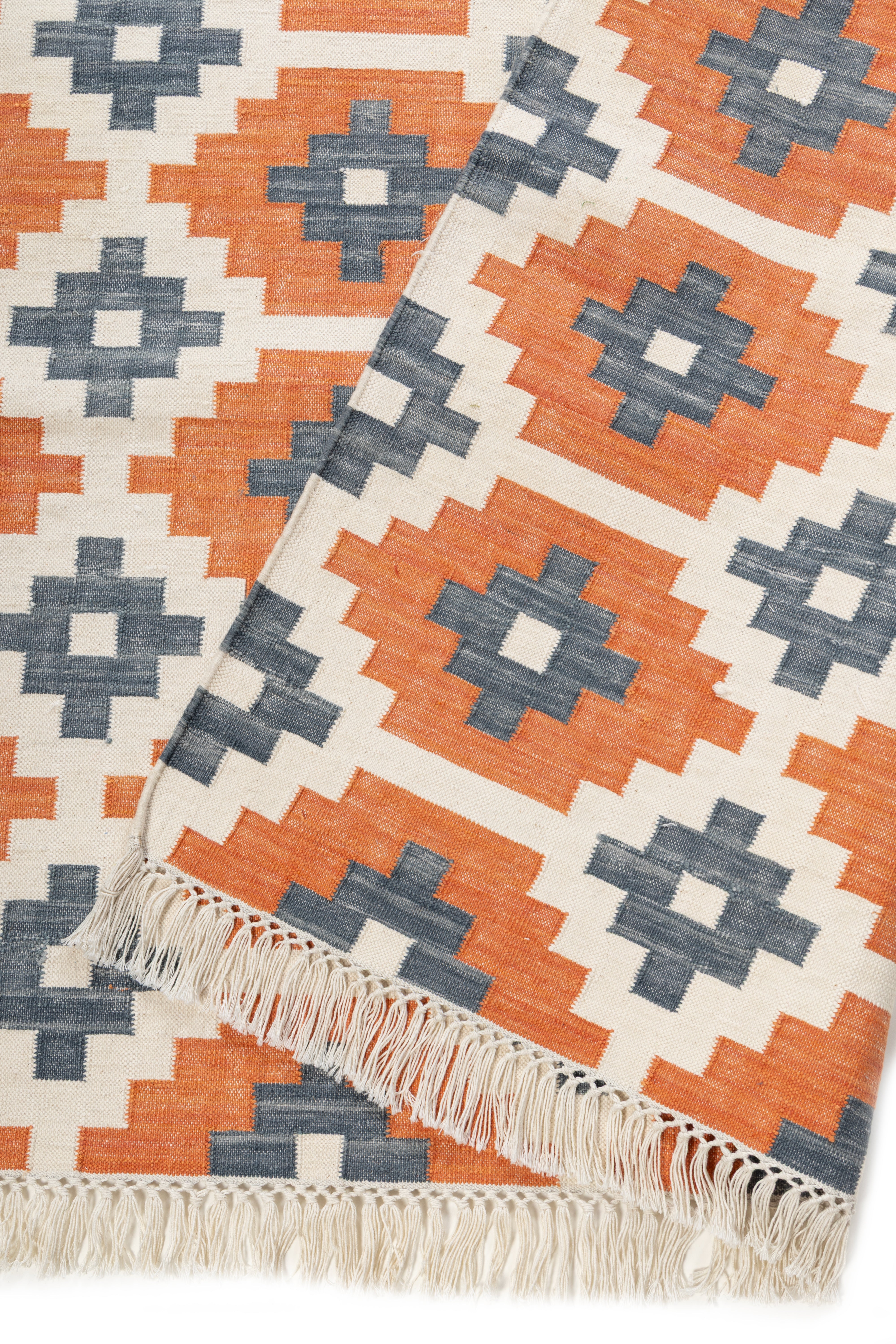 Ember Echo Kilim Rug detail of the geometric pattern in cotton