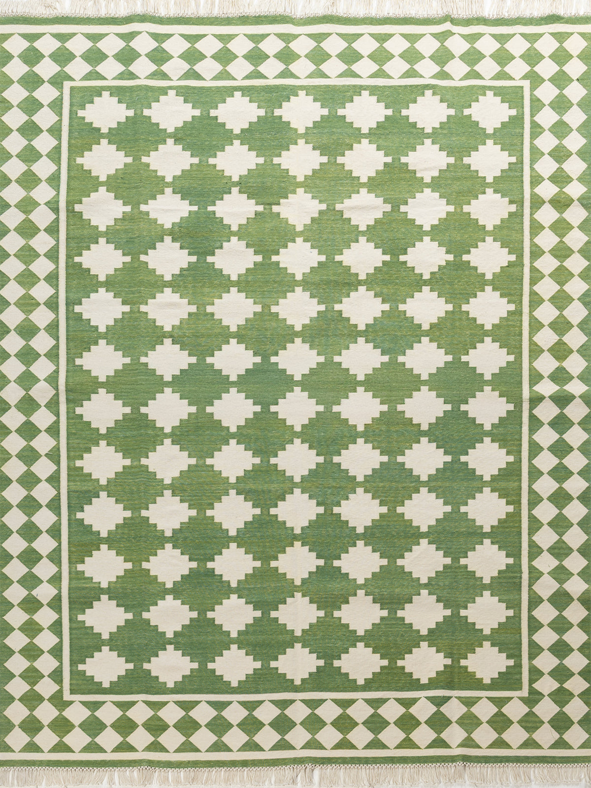 Emerald Echo cotton rug in green tones